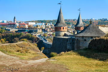 Fototapeta na wymiar View of Kamianets-Podilsky famous ancient fortress and part of the town in the autumn, Ukraine.