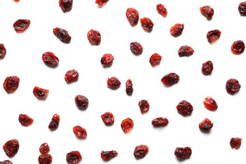 Flat lay composition of cranberries on white background. Dried fruit as healthy snack