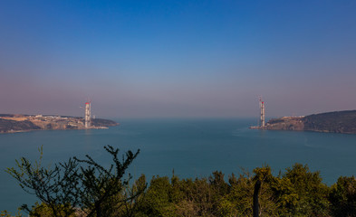 Fototapeta premium Construction of the Sultan Selim Grozny Bridge in the Bosphorus Strait, March 2014, Turkey