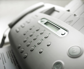 Close-up office supplies, white telephone fax machine