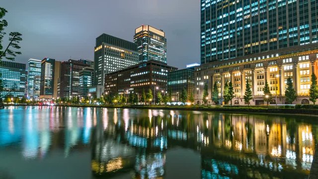 Timelapse of City Lights Reflected on Moat in Tokyo -Zoom In-
