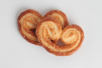 puff pastry cookies isolated on white background - Imagen