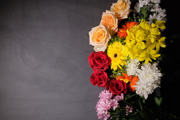 Colorful flowers on grey background.Bouquet of flowers