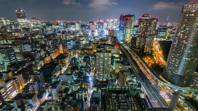Timelapse Overview of Congested Tokyo Cityscape at Night -Zoom In-