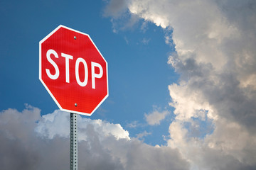 Stop Sign With Blue Sky And Storm Clouds