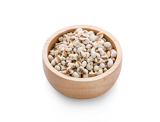 Job's tears or Coix lacryma-jobi in a wooden bowl isolated on white background,