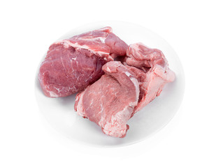 Fresh pork on a white plate isolated white background.