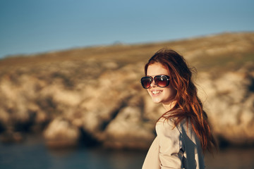 woman with glasses in nature