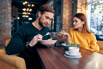 business colleagues in a cafe lunch talking