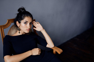 sexy woman sitting on a chair