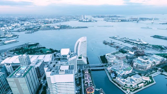 Timelapse Overview Day to Night of Yokohama Waterfront -Tilt Down-