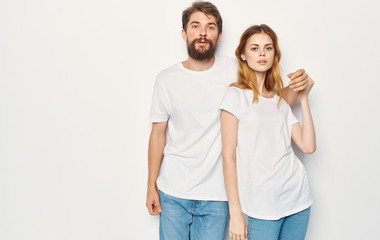 Fototapeta premium young couple in white t-shirts