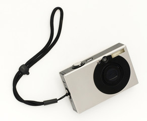 Small digital camera, isolated on white background