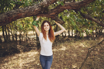woman at the cottage tree summer