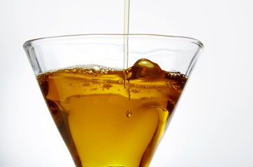 Close-up of oil, isolated on white background