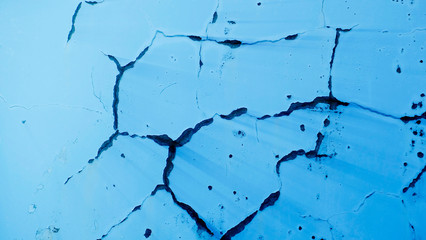 Rusty painted metal texture, old iron surface with shabby cracked paint and scratches