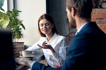 business colleagues chatting in a cafe