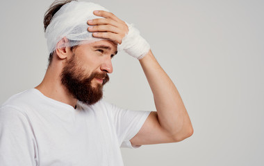 head shake man bandage bruises