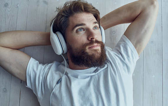 Man Listening To Music On Headphones