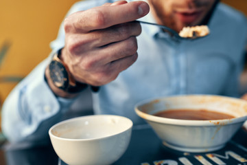 man has lunch