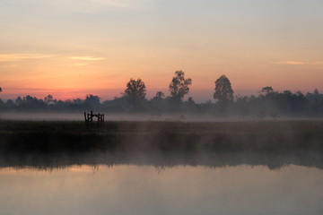 twilight sun rise. silhouette at countryside.