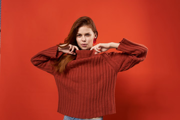 woman in a red sweater