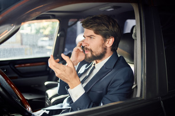 business dinner talking on the phone sitting in the car