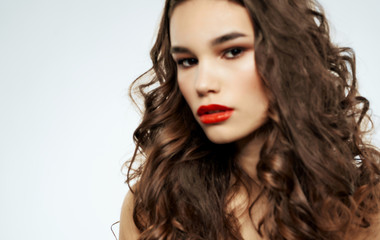 Fototapeta premium beautiful woman with curls with makeup portrait beauty
