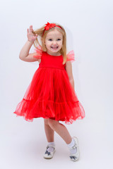 Concept portrait of a cute little girl in fashionable clothes. beautiful child