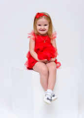 Concept portrait of a cute little girl in fashionable clothes. beautiful child