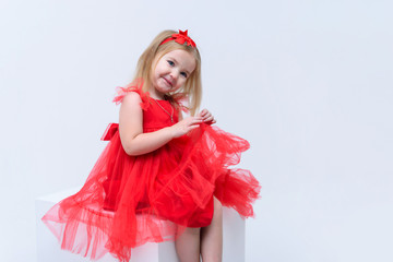 Concept portrait of a cute little girl in fashionable clothes. beautiful child