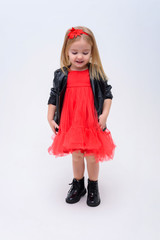 Concept portrait of a cute little girl in fashionable clothes. beautiful child