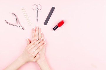 Obraz na płótnie Canvas French manicure on pink background