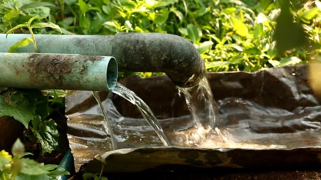 Flowing of waste water from pipe in the house , Chiangmai Thailand
