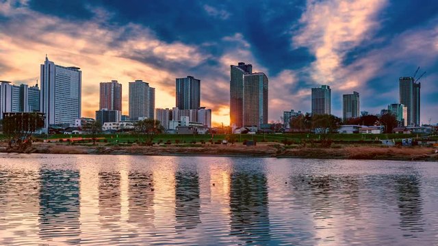 Timelapse Day to Night Transition of Skyline Reflection in Tokyo 