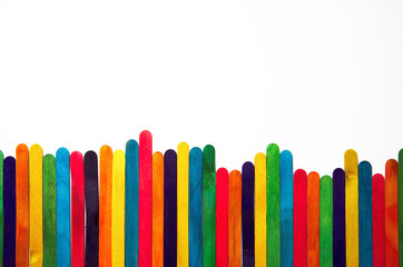 colored background of wooden sticks for ice cream