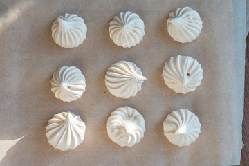 group of sweet meringue on a table
