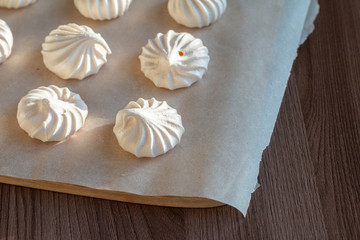 group of sweet meringue on a table