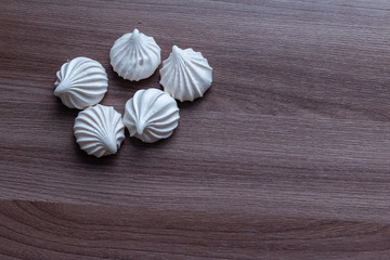 group of sweet meringue on a table