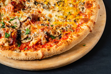 pizza on the black background
