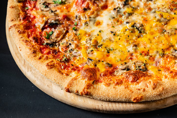 pizza on the black background