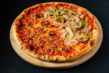 pizza on the black background