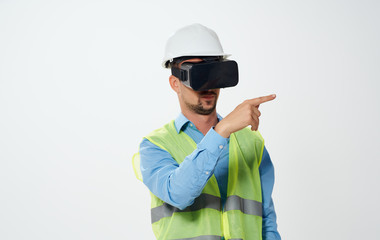 builder in a helmet in 3d glasses