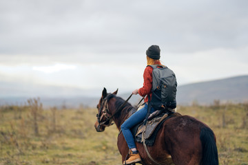 woman riding a horse
