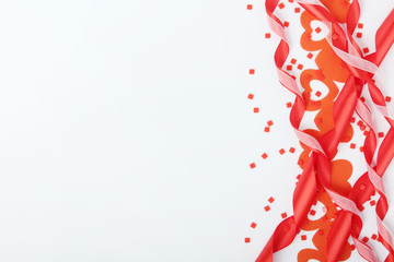 Background wit red ribbon and bright hearts for Valentine day decoration