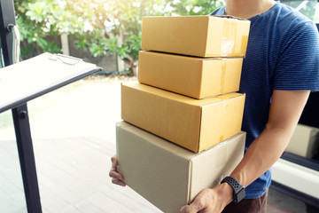 worker man delivery the boxs to home
