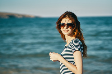 young woman on the beach sea trip 