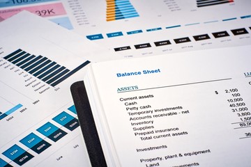 balance sheet on the background of financial documents, close-up