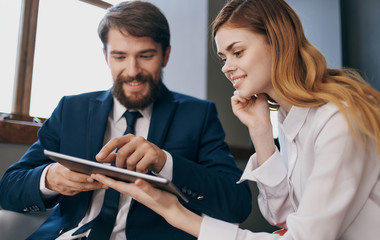 business colleagues with tablet
