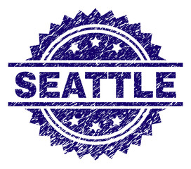 SEATTLE stamp seal watermark with distress style. Blue vector rubber print of SEATTLE text with unclean texture.